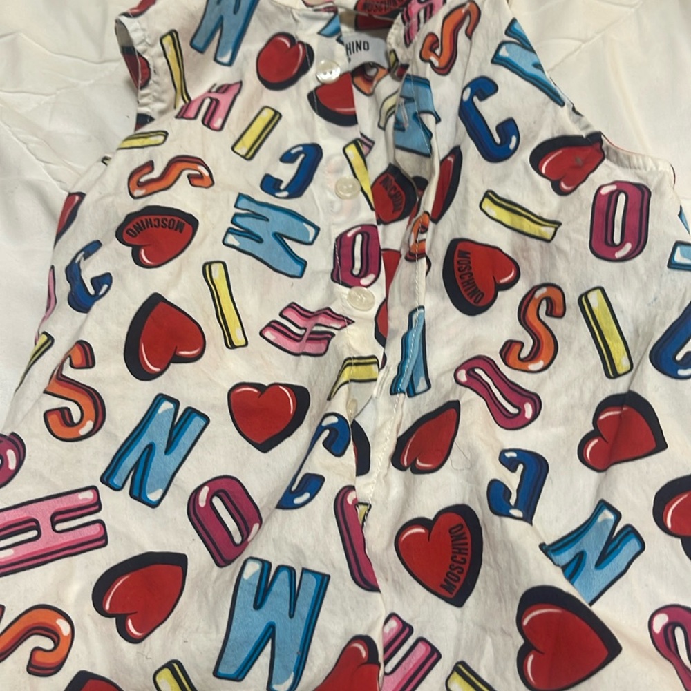 Kids top can be worn a tie front very cute
